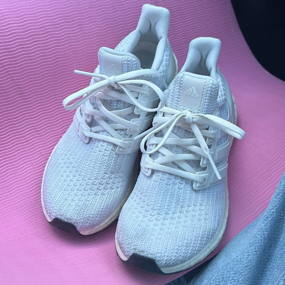 All white Adidas Ultra Boost